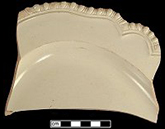 Molded plate rim with 'bead and reel' pattern.